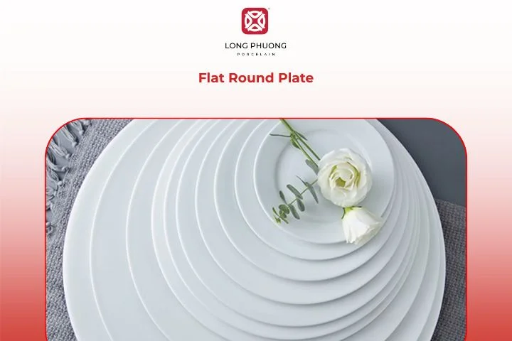 Flat white plate showcasing colorful main course dish