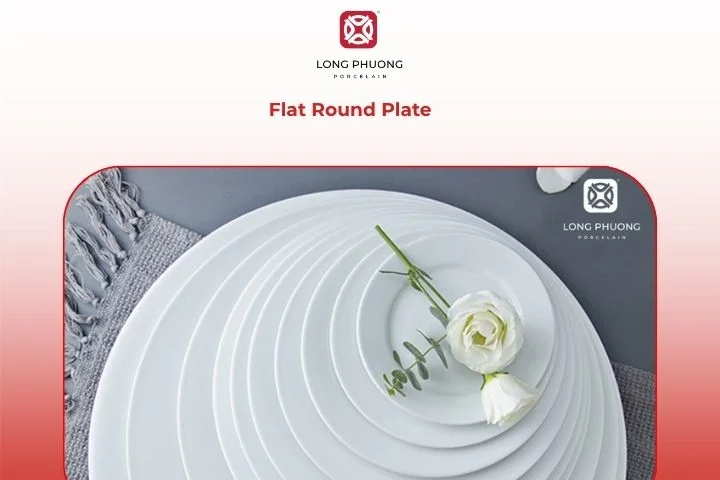 Flat white plate showcasing colorful main course dish