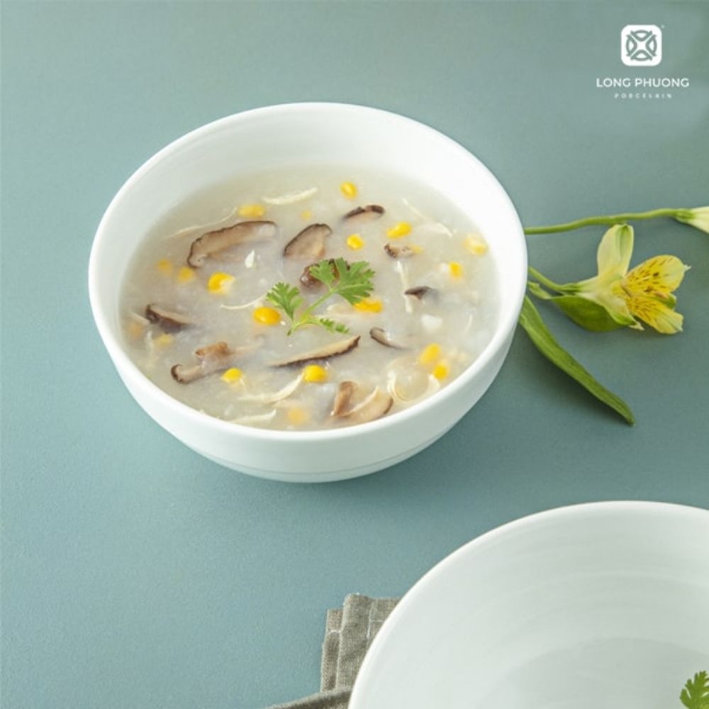 Long-Phuong’s-rimmed-porcelain-serving-bowl (3) Perfect as a rimmed porcelain serving bowls, it works beautifully for family-style