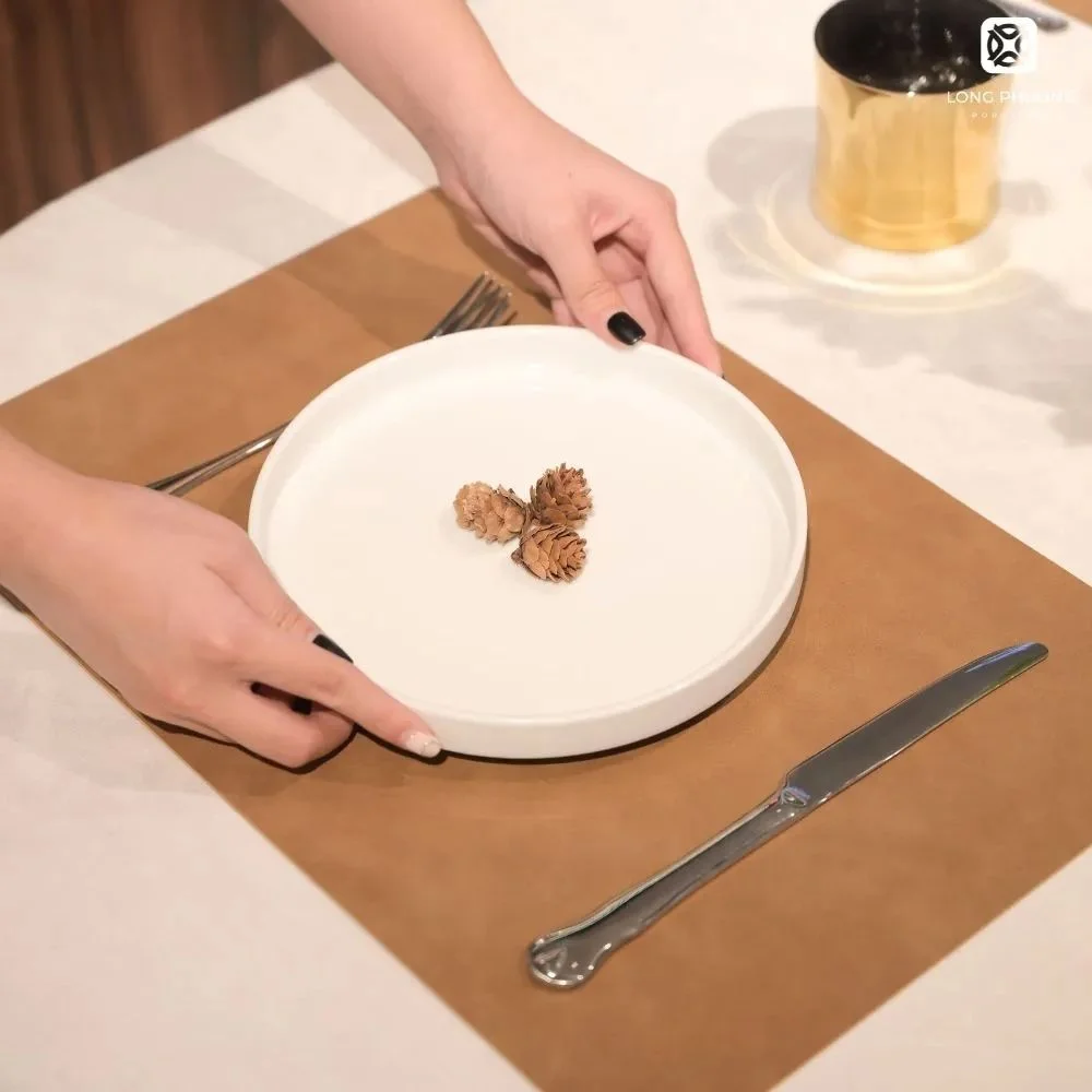 Shallow-Round-Plate-with-Rim (4) Featuring a gently raised rim and minimalist profile