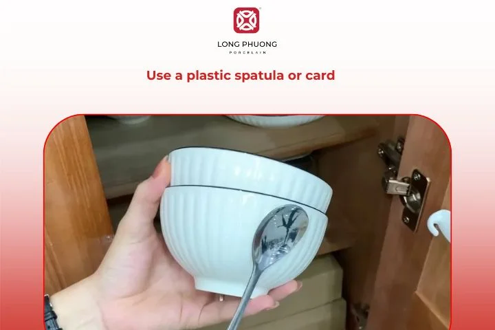 Use a plastic spatula or card