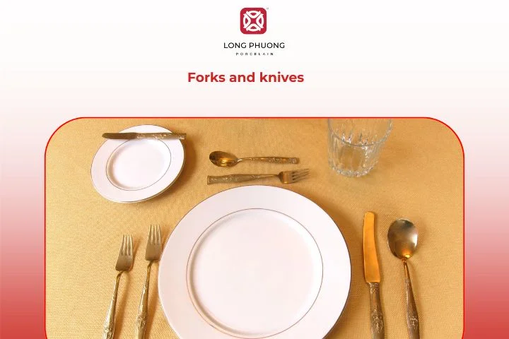 Forks and knives arranged neatly on each side of the dinner plate