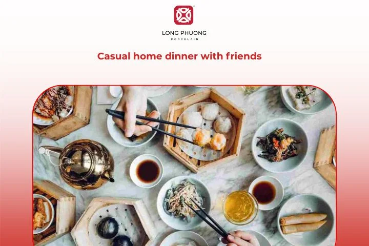 A relaxed dinner table glows with floral porcelain plates and friendly conversations