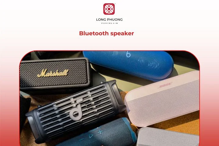 A Bluetooth speaker fills his space with music and positive energy.