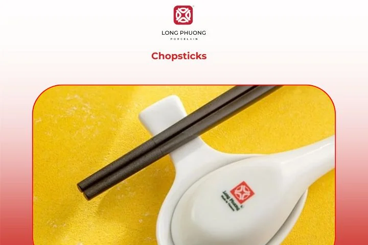 Wooden chopsticks beside porcelain bowls