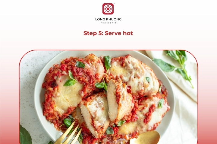 Serving hot chicken with mozzarella cheese garnished with fresh basil